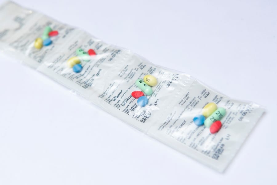 Parata PASS™ medication packaging with connected, individually labeled pouches containing scheduled doses